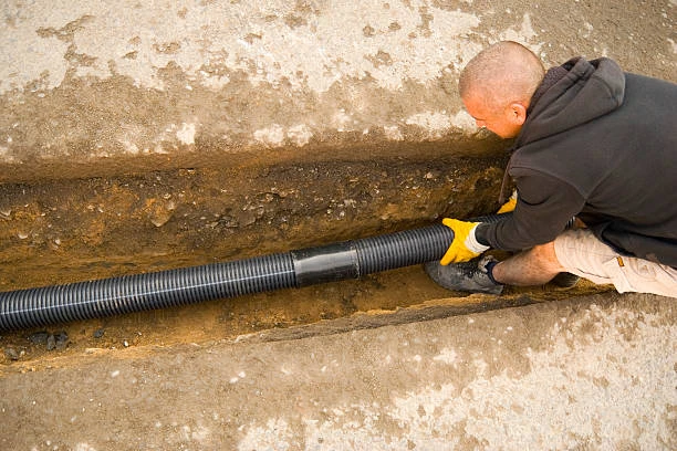 Adjustable-Height Drains for Slope Adaptation: Old House Renovation